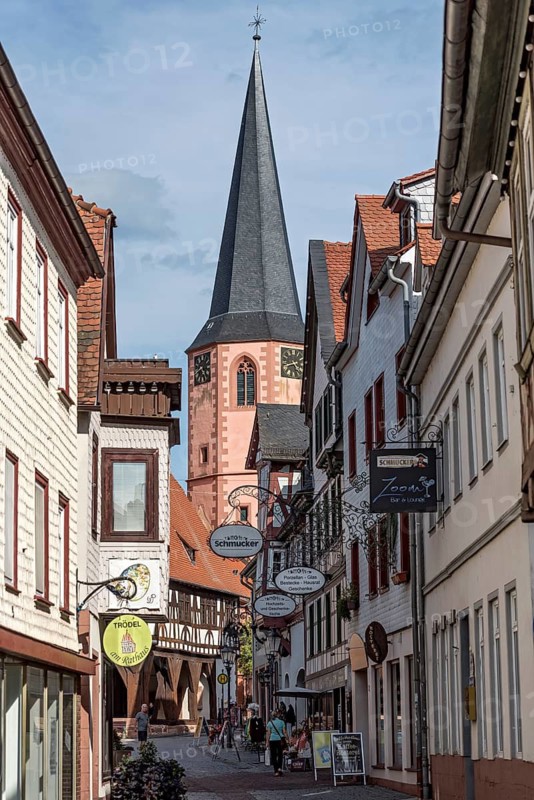Protestant late Gothic town church, bell tower, alley, shopping alleyway, Neutorstraße, historic old town, Michelstadt, Odenwald, Hesse, Germany