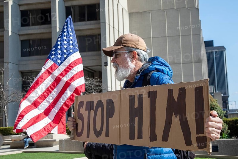 Detroit, Michigan USA - 7 April 2026 - People rally at the Federal Building to protest President Trump's threat to bomb all bridges and power plants in Iran. Trump has said he will wipe out a whole civilization if Iran does not agree to reopen the Strait of Hormuz