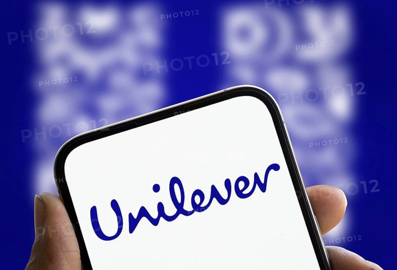 unilever logo is displayed on smartphone. Unilever PLC is a British multinational fast-moving consumer goods company