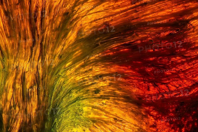 A stunning abstract of the Riotinto River in Huelva, Spain, showcasing vibrant yellow, orange, and red hues Nature's palette is vividly captured in this unique landscape