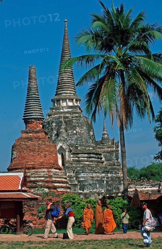 Monks, chedis, palm tree at Wat Phra Si Sanphet, Ayutthaya, Thailand, December 2002, vintage, retro, old, historic