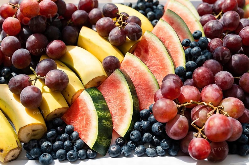 Fresh fruit lying on a plate in the sunset light