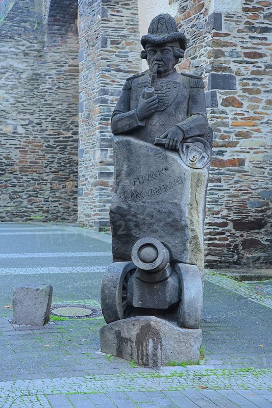 Funkennarrenbrunnen with cannon to commemorate and memorial of historic carnival, stone sculpture, Andernach, Rhineland-Palatinate, Upper Middle Rhine Valley, Germany