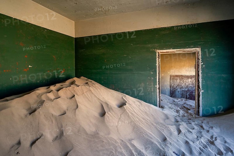 Former dwelling house full of sand, Kolmanskop, restricted diamond area, Karas region, Namibia