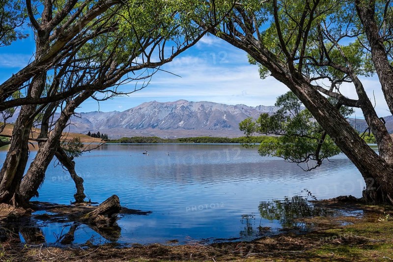 Landscape with lake and mountains. Lake McGregor, Tekapo, Canterbury, South Island, New Zealand