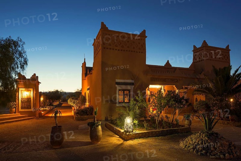 Kasbah style hotel, blue hour, Boumalne Dades, Dades Valley, Atlas Mountains, Morocco