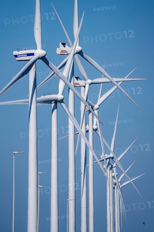 Wind farm on the Nordzeeweg, on a long spit of land between the Maas and the Calandkanaal in the Europoort harbour of Rotterdam, Netherlands