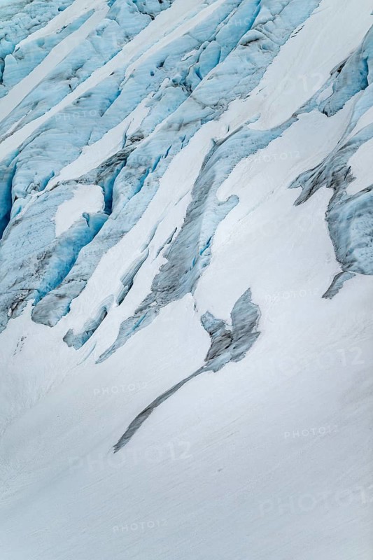 Blue rugged glacier ice with crevasses and snow, detail, Exit Glacier, Kenai Peninsula, Alaska, USA
