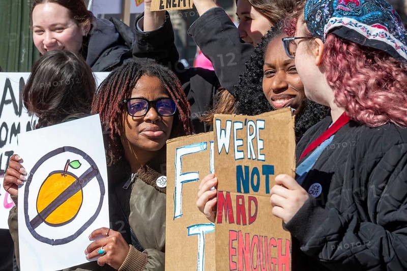 Detroit, Michigan USA - 28 March 2026 - People gathered at more than 100 'No Kings' rallies across Michigan. They were fighting to preserve democratic institutions, and protesting President Trump's actions against immigrants and getting the U.S. into a new foreign war