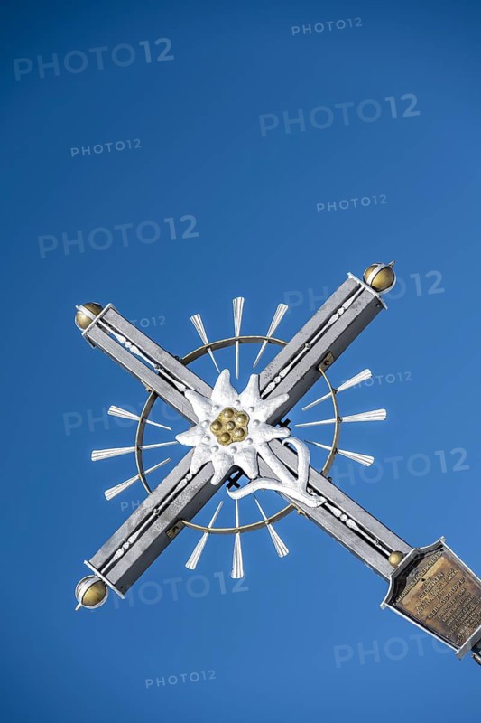 Summit cross with edelweiss, Sonntagshorn, Chiemgau Alps, Bavaria, Germany