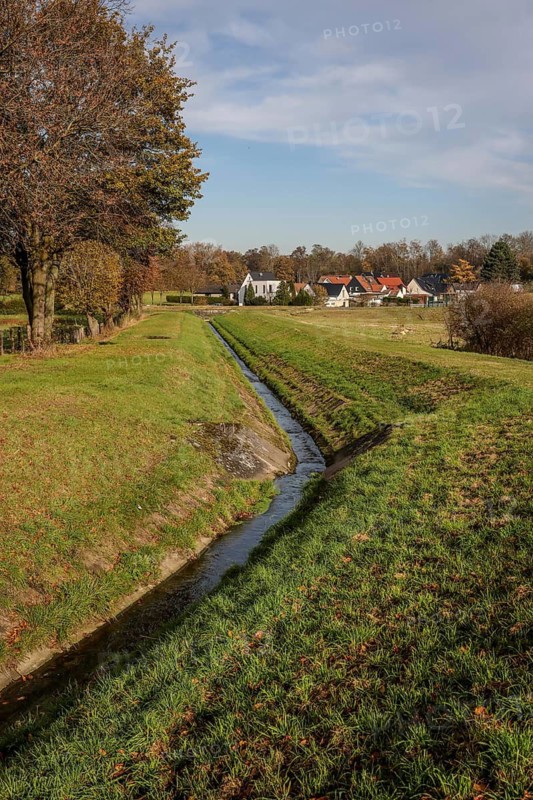 10.11.2021, Datteln, North Rhine-Westphalia, Germany - Following the construction of a parallel sewer, the Westerbach is now free of wastewater, is part of the Lippe river system and was previously an open, above-ground wastewater sewer, mixed sewer with surface water and wastewater. However, the stream still flows in the old concrete shells. Together with the Steinrapener Bach, the stream forms the Dattelner Mühlenbach