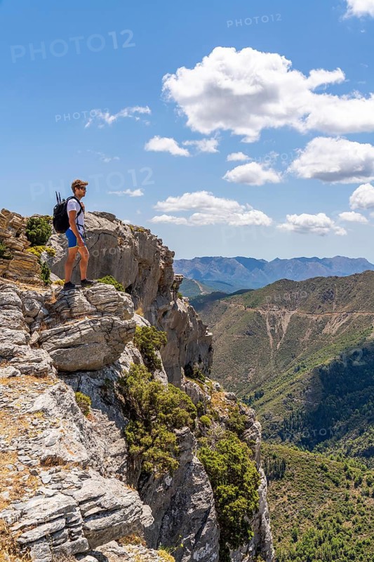 Hikers at the Tajo de la Caina and Mirador Luis Ceballos, Sierra de las Nieves National Park, Malaga, Andalusia, Spain