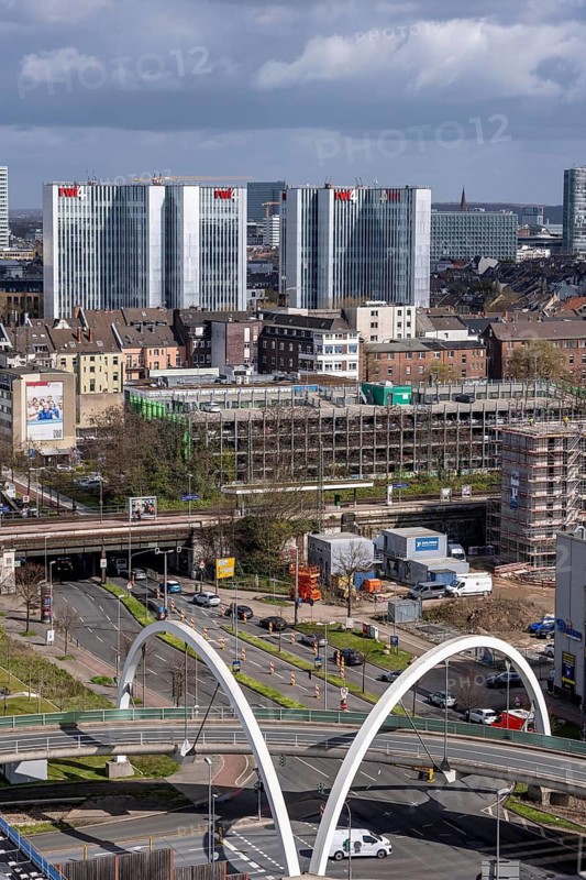Skyline of buildings in downtown Düsseldorf, RWI4 building complex, road bridge on Völklinger Straße, view from south to north, North Rhine-Westphalia, Germany