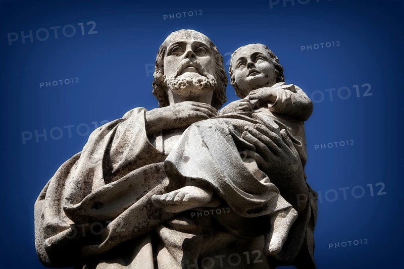 Stone statue, Saint Joseph with the Infant Jesus, courtyard of Marienstatt Abbey, Streithausen, Rhineland-Palatinate, Germany