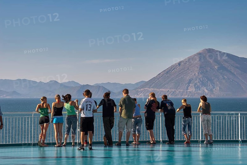 People standing on the deck of a ferry with a view of sea and mountains, Old ferry port in the center of Patras, Ferries, Patras, Peloponnese, Greece
