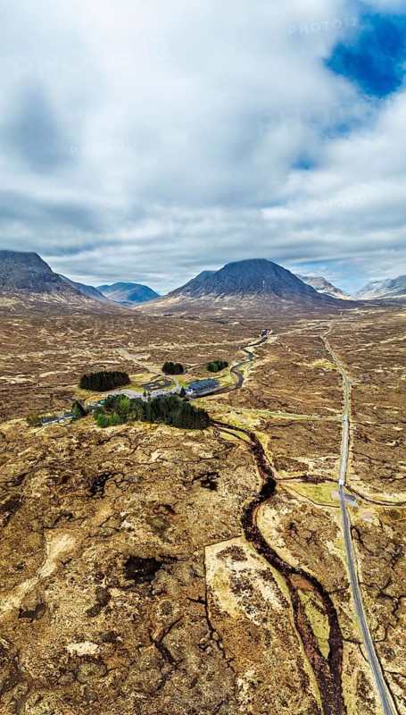 Panorama of Mountains and Moors over Glen Etive Valley from a drone, Buachaille Etive Mòr, The Buachaille, Highlands, Scotland, United Kingdom
