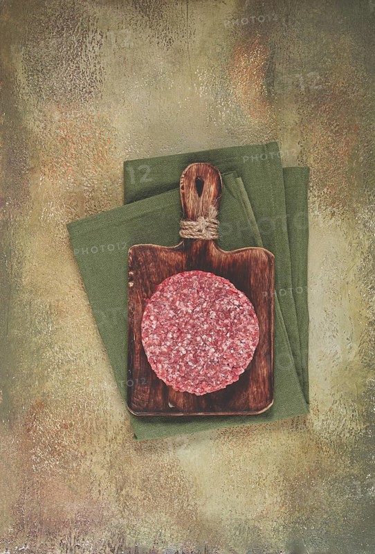 Raw cutlets, for burgers, minced meat, handmade, homemade, with spices, top view, no people