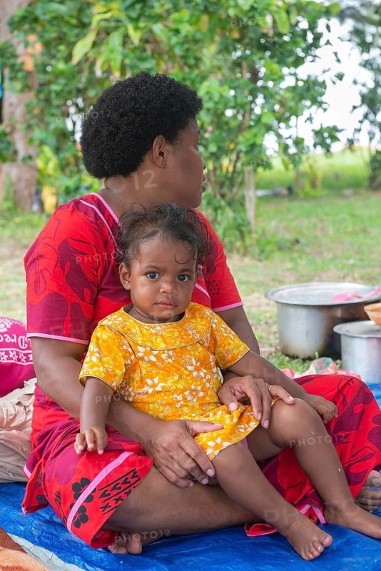 Family at village ceremony, Yasawa Island group, Fiji, South Pacific