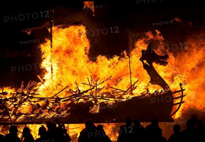UK. Scotland. Shetland Islands. Lerwick. During the annual biggest and spectacular Fire Festival in Europe known as Up Helly Aa the ceremony finishes as in old Celtic Viking tradition by the burining of the ship