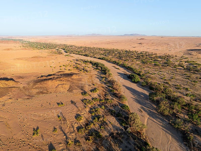 Aerial view, dry riverbed and desert landscape at Ugab River, Erongo, Damaraland, Namibia