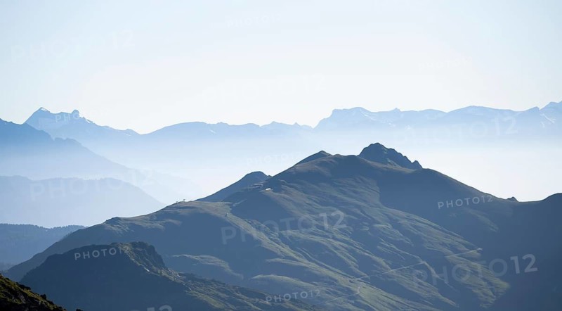 Mountain silhouettes in morning light, Bernese Alps, Bernese Oberland, Switzerland