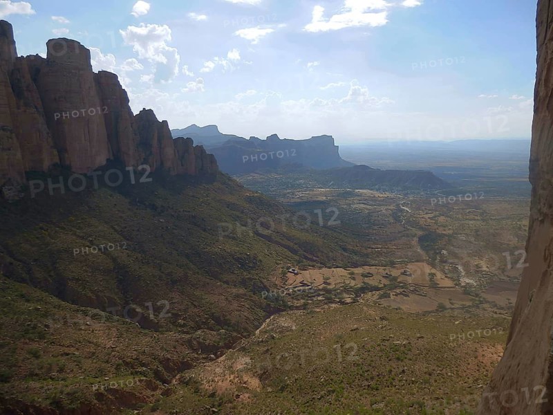 Breathtaking panoramic view of mountains and valleys in sunlight from Rock Church, Abuna Yemata Guh, Tigray, Ethiopia