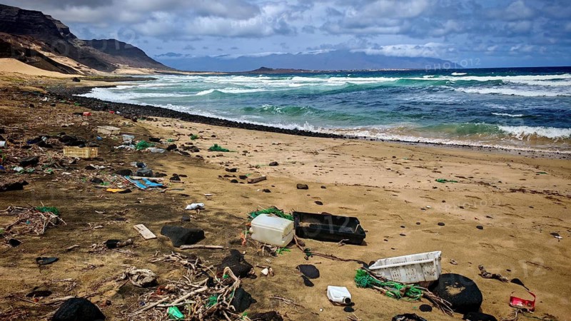 Waste and plastic waste, beach polluted with garbage and waves hitting the coast, Calhau migration, environmental protection, microplastics, Baia das Gatas, Sao Vicente, Cabo Verde, Cape Verde, Cape Verde