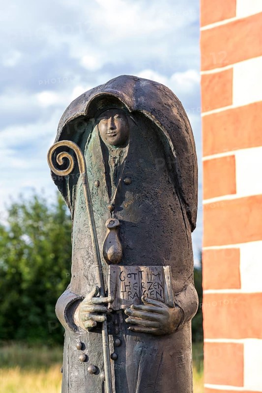 Bronze figure of St Walburga in front of the St Walburga Chapel on the Walberla, Ehrenbürg, Franconian Alb, Bavaria, Germany