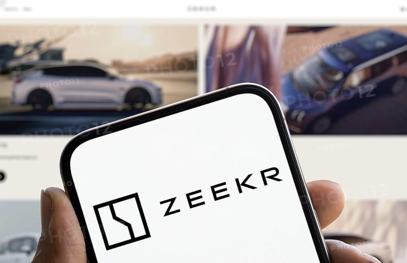 Zeekr logo is displayed on smartphone. Zeekr Technology Group is a Chinese publicly listed automobile company