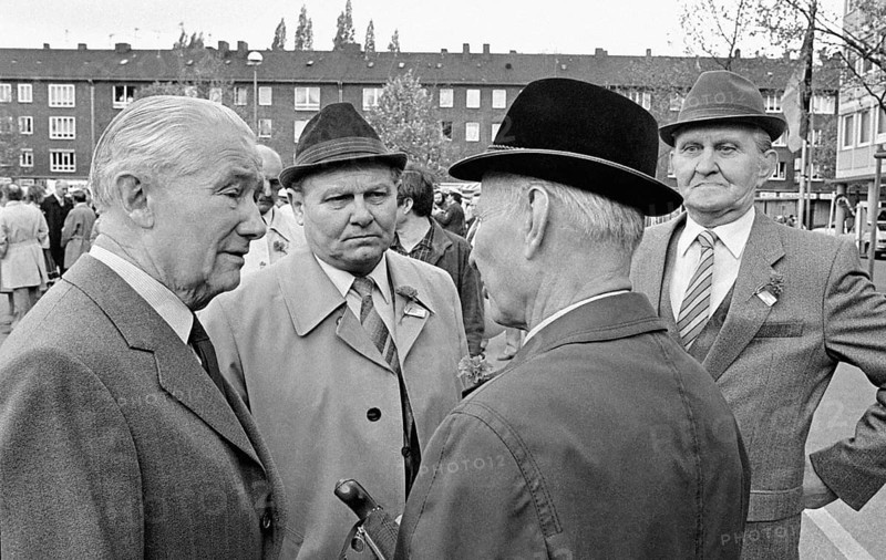 Gelsenkirchen, DEU - 01.05.1983 - Men have gathered on the market square in Gelsenkirchen, May 1st rally of the DGB, Gelsenkirchen, Germany