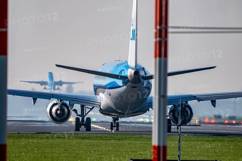 Amsterdam Schiphol Airport, Aalsmeerbaan runway, 18L-36R, KLMflieger on the runway, waiting for take-off, other aircraft taking off, Netherlands