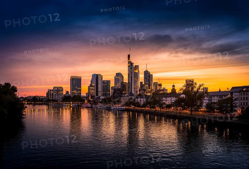 View of the Frankfurt skyline at sunset from the Alte Brücke, Old Bridge, Frankfurt am Main, Hesse, Germany