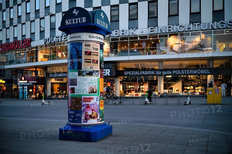 Advertising column, RMöbelhaus Segmüller, logo, city center, advertising, neon, Rotebühlplatz, twilight, Stuttgart, Baden-Württemberg, Germany