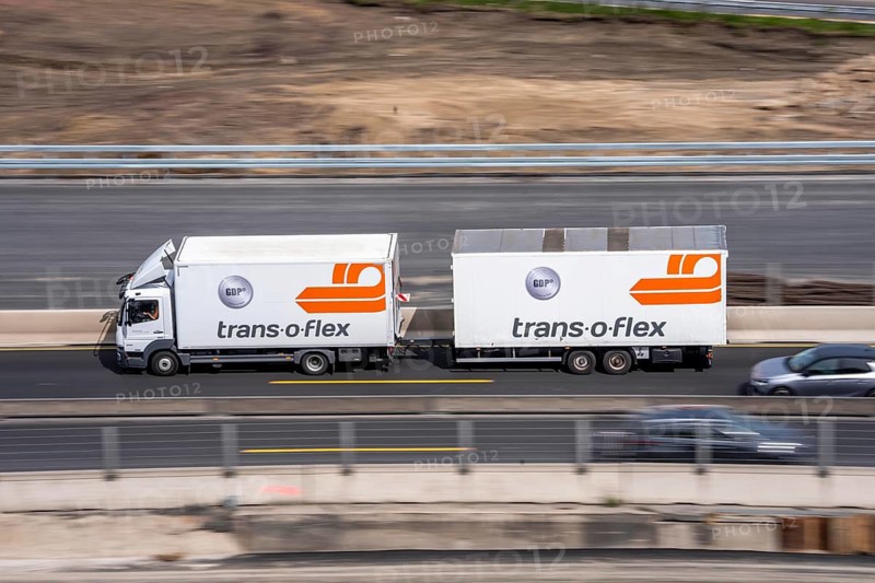 Freight truck from freight and logistics service provider trans-o-flex, on the motorway