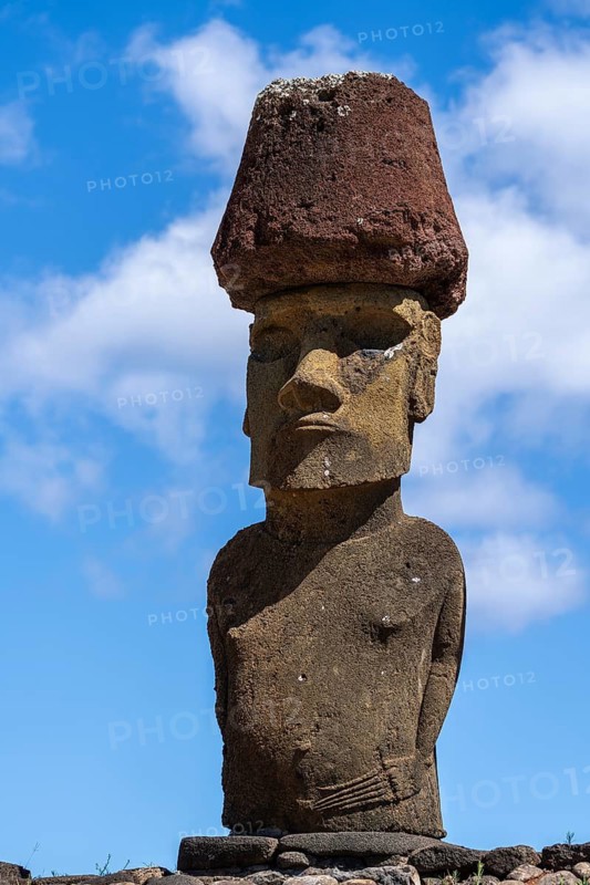 Moai statue with red tuff pukao on stone platform, Ahu Nau Nau, Anakena, Easter Island, Chile