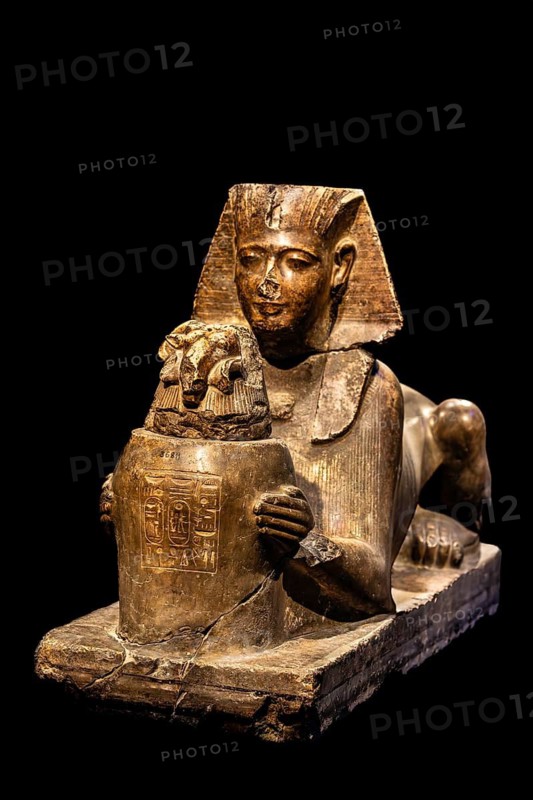 Statue of Ramses II as a sphinx offering a vessel with a ram's head from the exhibition: Ramses the Great and the Gold of the Pharaohs, Cologne, North Rhine-Westphalia, Germany