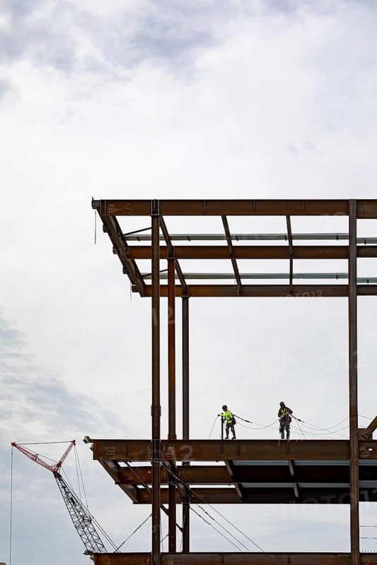 Detroit, Michigan - Workers string safety lines as structural steel rises on a $2.2 billion expansion of Henry Ford Hospital's main campus. Completion is expected in 2029