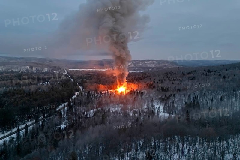 House fire in a forest area, Region of La Mauricie, Province of Quebec, Canada