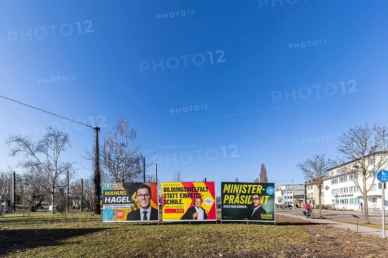 2026 state election in Baden-Württemberg. Election posters at a crossroads in Fellbach. Large posters from CDU, FDP and Die Grünen. Fellbach, Baden-Württemberg, Germany