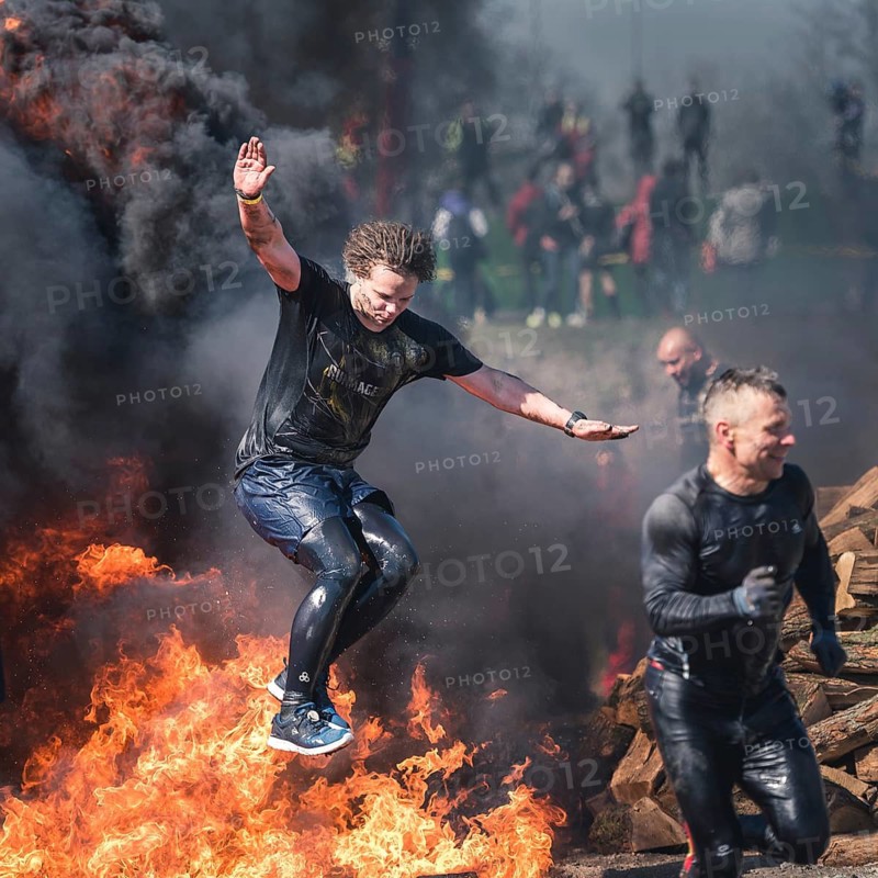 WROCLAW, POLAND - APRIL 7, 2018: Extreme running with obstacle RUNMAGEDDON. In the picture a runner on the Recruit route