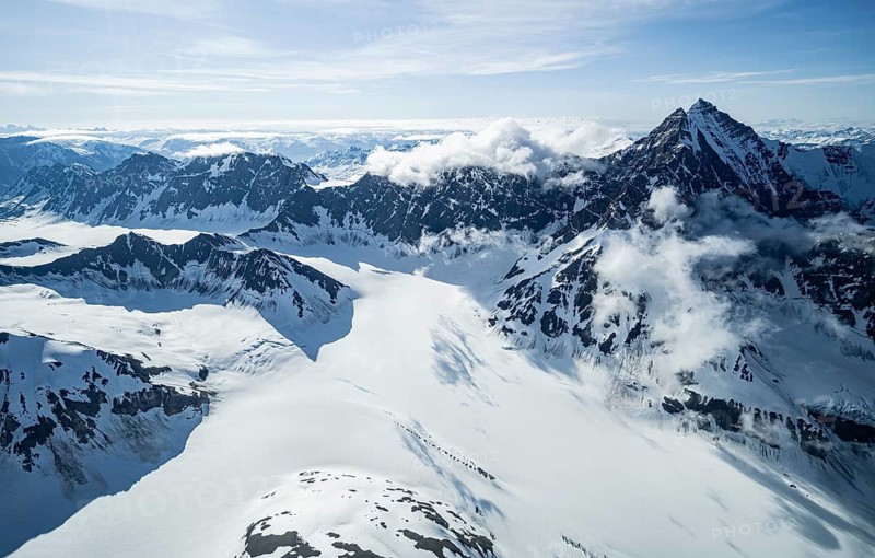 Snow and ice, epic mountains with glaciers, aerial view, Alaska Range, Denali National Park, Alaska, USA