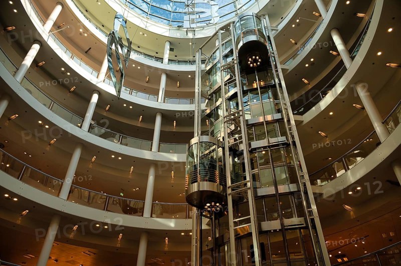 Interior view, glass dome of Karlspassage in the Breuninger department store, shopping center, lift, Stuttgart, Baden-Württemberg, Germany