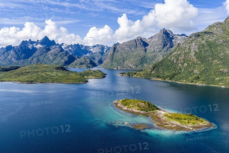 Aerial view over the Raftsund, the waterway between Lofoten and Vesteralen island, island Rognholman in front, entry to famous Trollfjord, Norway