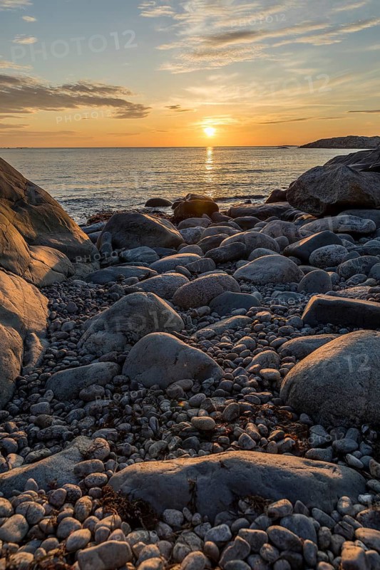 Sunset on the North Sea with archipelago on the west coast near Lerkil, Hallands län, Sweden