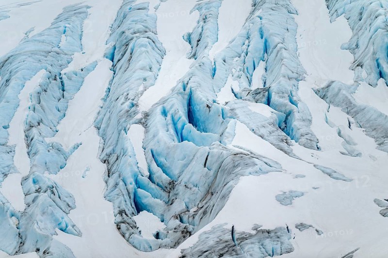 Blue rugged glacier ice with crevasses and snow, detail, Exit Glacier, Kenai Peninsula, Alaska, USA