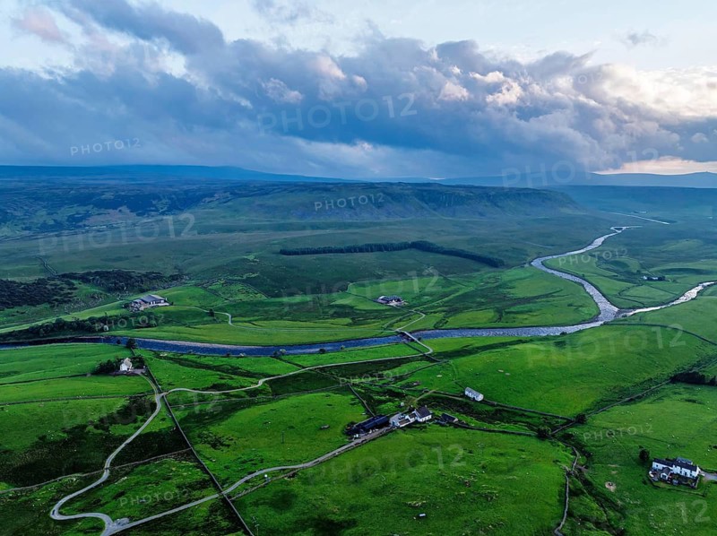 Forest in Teesdale over River Tees from a drone, North Pennines AONB, County Durham, England, United Kingdom