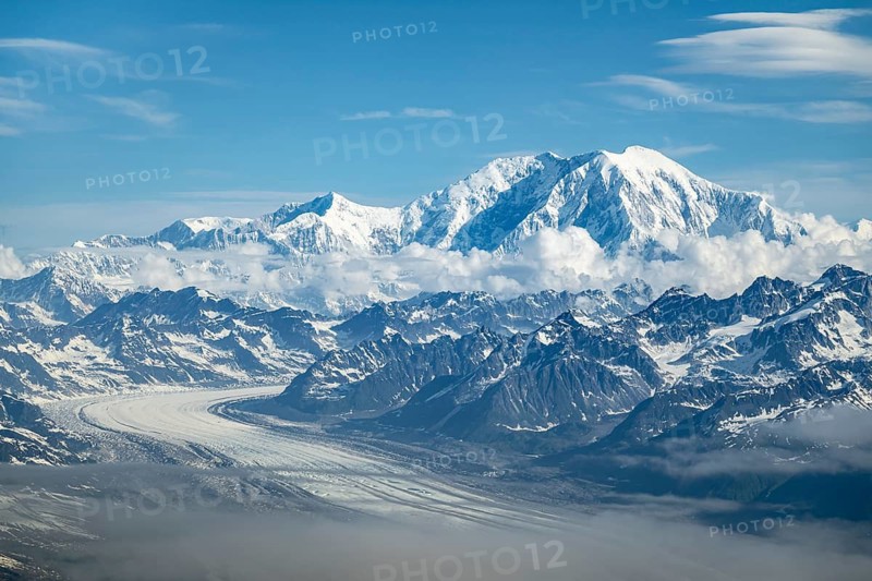 Clouds over high mountains, Mt Foraker with Kahlitna Glacier, aerial view, Alaska Range, Denali National Park, Alaska, USA