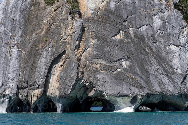 Marble caves (Capillas de Mármol), eroded marble rock formations with caves and arches on the turquoise waters of Lake General Carrera, Puerto Río Tranquilo, Región de Aysén, Chile