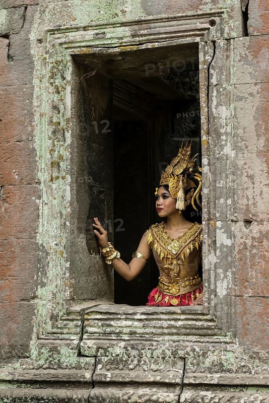 Young woman dressed as a temple dancer, Apsara, Ta Prohm, Angkor Wat, Angkor, UNESCO World Heritage Site, Siem Reap, Cambodia, Indochina, Southeast Asia