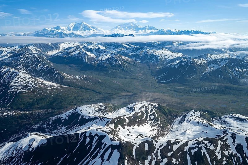 Clouds over high mountains, Mt Foraker and Mt Denali or Mount McKinley, aerial view, Alaska Range, Denali National Park, Alaska, USA